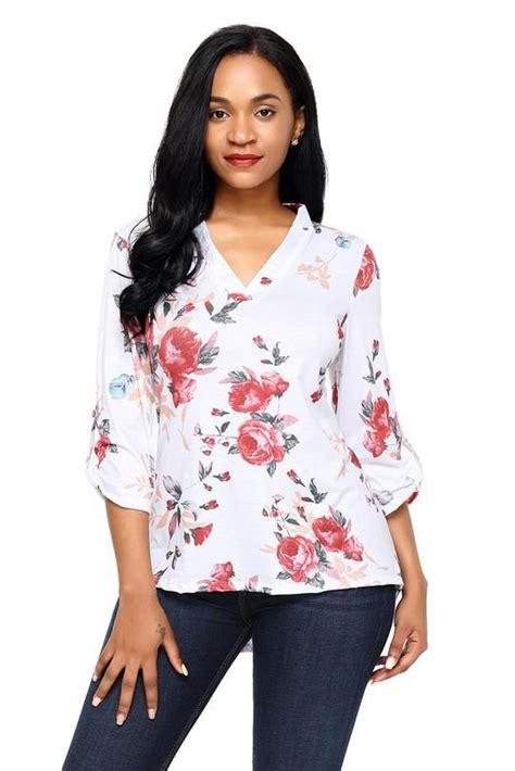 white blouse with red flowers